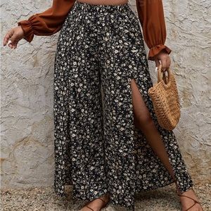 SHEIN 1x flowy slit in both thigh floral shorts underneath wide leg pants.